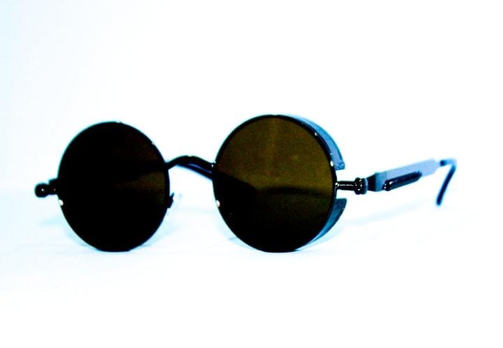 Round sunglasses with dark lenses on a white background